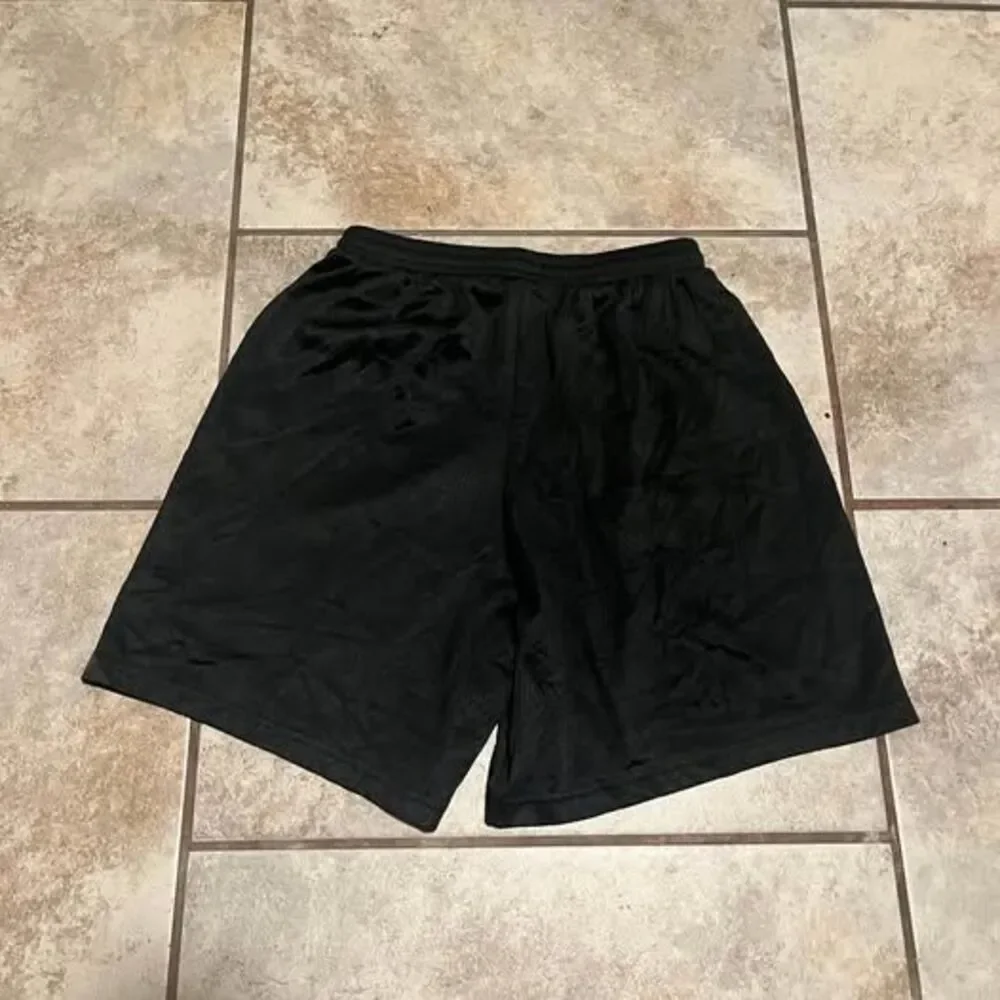Y2K-era Nike running track shorts size youth  m (12)